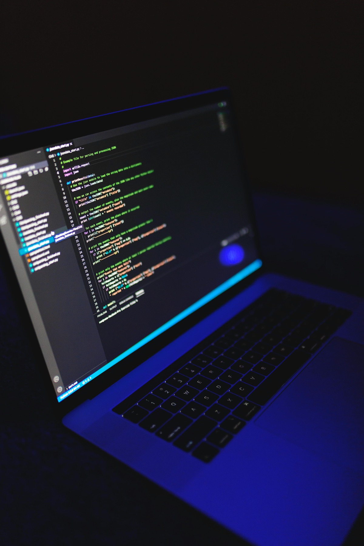 Laptop screen with programming code for technical courses and tutoring